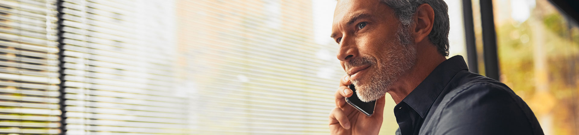 Businessman on a phone call in his office